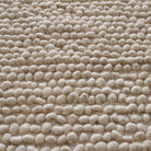 Tapis en laine naturelle Nunamae - Écru | Effet bouclé